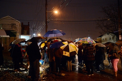 Despite heavy rains, dozens came out for a vigil held in honor of Brian "Lil Brucey" Wright Jr., 26, Tuesday evening at the corners of Enterprise Street and Tangent Way in Larimer.  Wright Jr. was found shot to death on this corner Feb. 23. Wright's older brother, Maurice Bruce, 32, was shot and killed after leaving a Homewood bar Feb. 4.