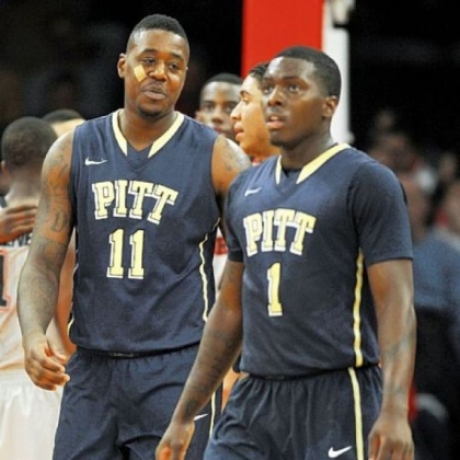 Tray Woodall, pictured with Dante Taylor on Sunday at St. John's, may be the closest thing to a go-to player that Pitt has.
