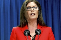 Attorney general weighs defending voter ID