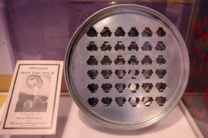 A communion plate and program from Martin Luther King Jr.'s funeral is part of the "1968: The Year That Rocked America" exhibit at the Heinz History Center. The exhibit runs through May 12.