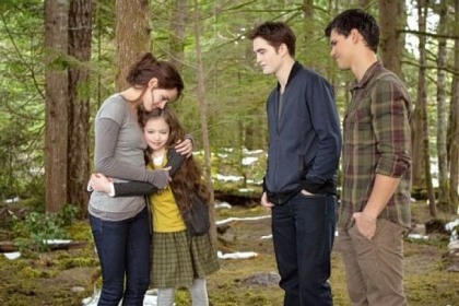 Kristen Stewart, left, Mackenzie Foy, Robert Pattinson and Taylor Lautner close the door on "Twilight" in the film finale "The Twilight Saga: Breaking Dawn -- Part 2."