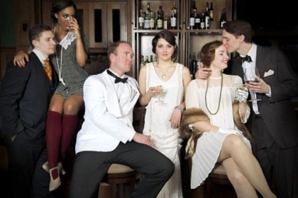 Ryan Kearney, left, portrays Tom Buchanan, Alexis Cash is Myrtle Wilson, Sean Patrick Sears is Jay Gatsby, Julia Warner is Daisy Buchanan, Katie Oxman is Jordan Baker and Andrew Swackhamer is Nick Carraway in Prime Stage Theater's production of "The Great Gatsby," based on F. Scott Fitzgerald's book.