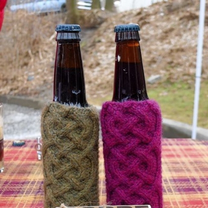 The 100-percent wool cozies are hand-knitted by Kate Hitmar.