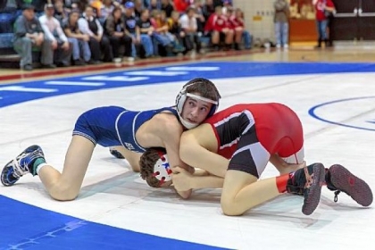 Burgettstown's Austin McDermitt, top, defeated Southmoreland's Austin Griffiths, 9-1, in WPIAL title match last Saturday.