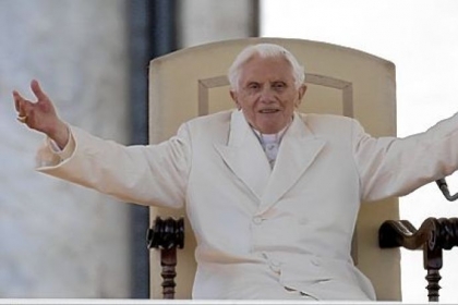 Pope Benedict XVI opens his arms during his final general audience Wednesday in St. Peter's Square at  the Vatican. Pope Benedict basked in an emotional send-off, recalling moments of "joy and light" during his papacy but also times of great difficulty.
