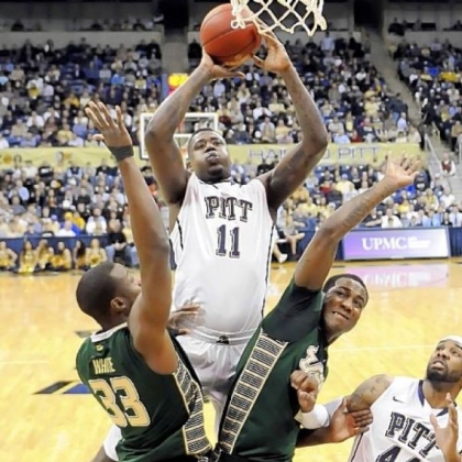 Dante Taylor drives to the basket between South Florida's Kore White and Victor Rudd Wednesday night at Petersen Events Center. Taylor had 12 points -- his first time in double figures in 19 games.