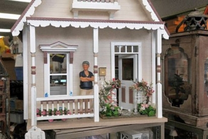 This miniature called "Kotton Candy" at Lynlott Miniatures Dollhouse Junction is electrified. Owner Debbie McManus says the small houses are pieces "of three-dimensional art."