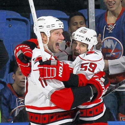 Jordan Staal, left, celebrates the tying goal Sunday against the Islanders in Carolina's 4-2 victory. Staal will face his former Penguins teammates tonight.