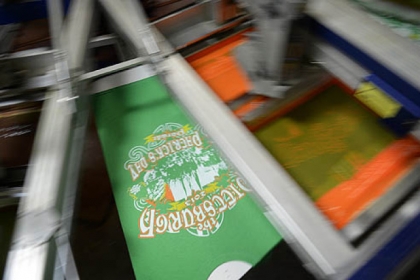 Pittsburgh's official St. Patrick's Day Parade T-shirt comes off the presses Thursday at All Pro Embroidery and Screenprinting in Baldwin.