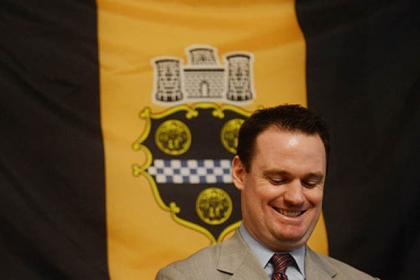 Mayor Luke Ravenstahl chuckles during the press conference announcing he will not run for re-election.