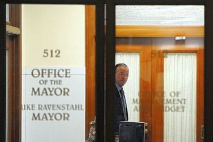Sgt. Dom Sciulli, one of Mayor Luke Ravenstahl's bodyguards, walks through the mayor's office Thursday in the City-County Building, Downtown.