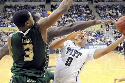 Pitt's James Robinson drives to the net against South Florida's Zach Leday in the first half Wednesday at Petersen Events Center. Coach Jamie Dixon likely will not use the freelance offense his team used against the Bulls much more.