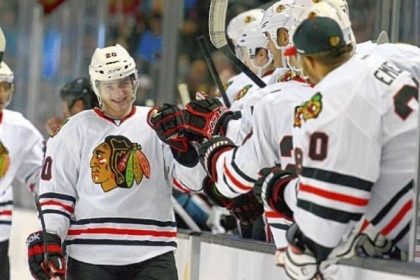 Pine-Richland graduate Brandon Saad of the Chicago Blackhawks is congratulated by teammates after scoring a goal in the first period of a Feb. 5 game in San Jose against the Sharks