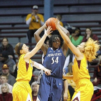 Penn State forward Nikki Greene tries to elude Minnesota guard Shayne Mullaney and forward Micaella Riche.