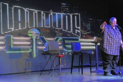 Billy Elmer, local comedian, performs in Latitude Live.