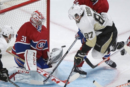 Montreal Canadiens goaltender Carey Price makes a save against the Penguins' Sidney Crosby during the second period.
