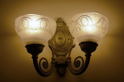 The Victorian-style house has several vintage details, including the light fixtures.
