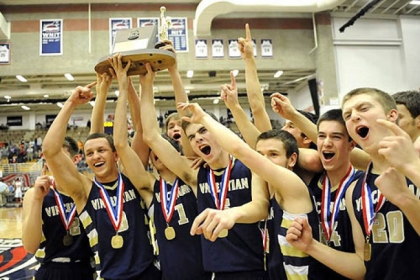 Vincentian teammates celebrate their win against Clairton in the WPIAL class A boys basketball championship Friday night at Palumbo Center.