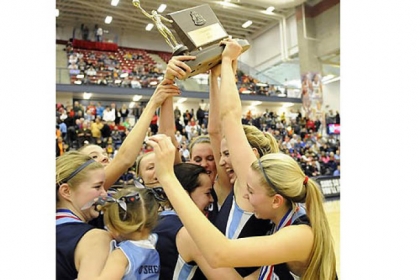 Bishop Canevin teammates celebrate after defeating Seton-LaSalle in the WPIAL class AA championship Friday night at Palumbo Center.