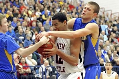 New Castle's Shawn Anderson, left, grapples for a rebound with Hampton's Ryan Luther.