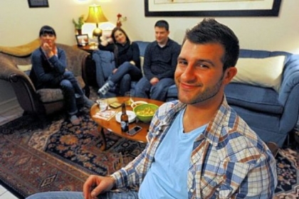 Lawrenceville's Chase Rogan with his wife, Taylor, left, and Megan and Paul Tarasi in Mr. Rogan's living room waiting for the ninth episode of Spike TV's "The Joe Schmo Show" to begin.