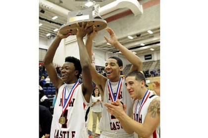 New Castle's Antonio Rudolph, Shawn Anderson and Brandon Dominick celebrate their team's win against Hampton in the WPIAL class AAAA championship Saturday.