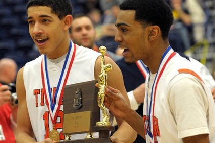 Beaver Falls' Dan Stratton and Micoy Mason celebrate their win against Burrell in the WPIAL boys AA basketball final.