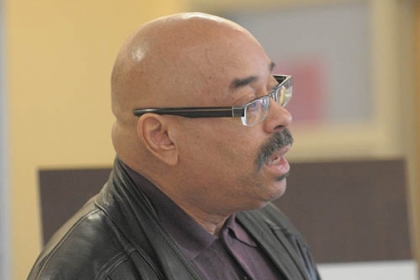 WQED's Chris Moore speaks at a press conference at the Manchester Youth Development Center to announce a major new initiative as part of The Heinz Endowments' African-American men and boys initiative and WQED's "Portrayal & Perception" multimedia series.
