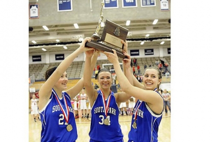 South Park's Halie Torris, Breanna Raymond and Shelby Lindsay hold up their trophy after defeating Elizabeth Forward in the WPIAL Class AAA championship Saturday.
