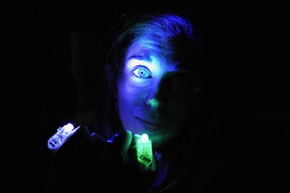 Elizabeth LeDonne of Monaca uses lighted rings to produce a portrait.