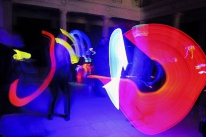 Carnegie Museum of Art encouraged photographic experimentation during the opening of "Oh Snap!," providing light elements for the creation of artwork. Above and below left, visitors made images in front of tripod-mounted cameras using long exposures and light emitting rods and hoops.