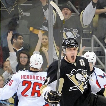 The Penguins' Evgeni Malkin celebrates a goal at Consol Energy Center.