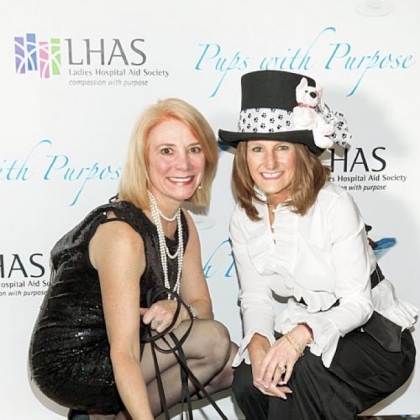 Laura Penrod Kronk and Dee Dee Troutman with Laura's therapy dogs, Hercules and Romeo.