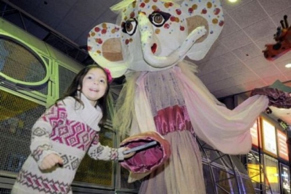 Avery Peters, 4, dances with a puppet.