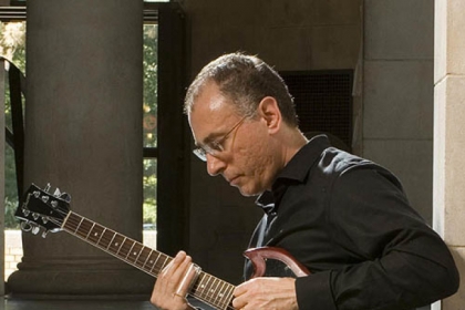 Guitarist and college professor John Marcinizyn will be performing at Downtown's Fairmont hotel starting at 7:30 tonight.