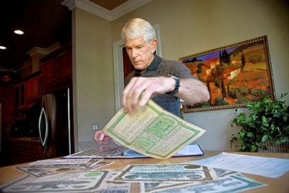 This paper stock certificate owned by Dick Brothers of Sacramento, Calif., dates to the 1920s. Most are from stock purchased by Mr. Brothers' grandfather for old silver and gold mining companies in Alaskan and Californian mining towns. The paper stock certificate is rapidly becoming a piece of a bygone era.