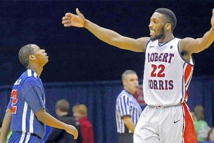 Robert Morris'' Lucky Jones celebrates near the end of his team''s win against St. Francis Wednesday night.