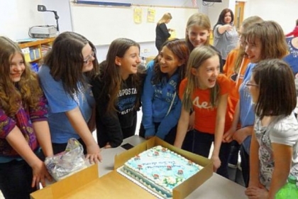 Members of the sixth-grade team from South Allegheny School District who won the Project Polar Bear Contest celebrate with an Arctic-themed cake after learning they captured first place in the contest.