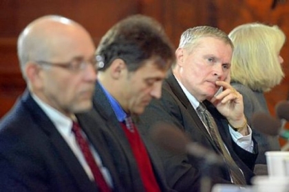 From left, David Harris, University of Pittsburgh law professor; Vic Walczak, legal director of the Pennsylvania American Civil Liberties Union; Robert McNeilly, former Pittsburgh police chief; and Beth Pittinger, executive director of the Citizen Police Review Board, listen during a Pittsburgh City Council post-agenda public hearing on the hiring of a new police chief.