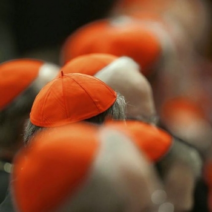 Cardinals gather in St. Peter's Basilica to attend a vespers celebration at the Vatican on Wednesday.