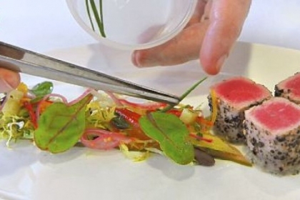 Chef Shawn Culp, of The Art Institute of Pittsburgh, plates his fancy Tuna, Palermo Style.