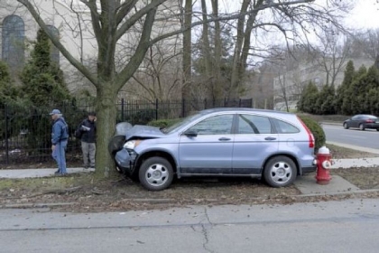 A driver turning left from Fifth Avenue onto Devonshire Street lost control and ended up wedged between a fire hydrant and a tree, destroying a mailbox in the process.