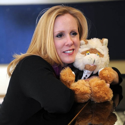 Soprano Katy Williams cuddles Fiddlesticks the Cat, her singing partner in the PSO's children's concerts.
