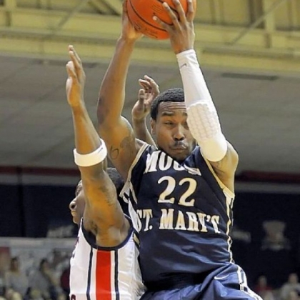 Mount St. Mary's Rashad Whack grabs a rebound Saturday. He scored 26 points to lead the Mountaineers to the upset in the NEC semifinals.