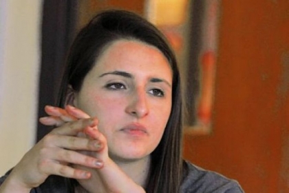 Senior Arianna DiMatteo listens in a session Monday with Gene Natali Jr. as he discusses financial literacy in Jill Tabis' classroom at Fox Chapel Area High School.