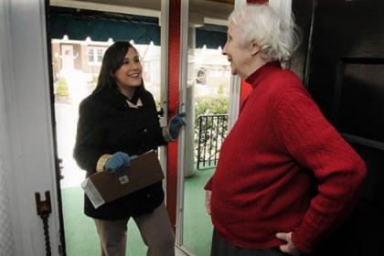 Krista Harris speaks Saturday with Mary C. Daly of South Meadowcrowft Avenue in Mt. Lebanon after getting a signature to be put on the ballot for a full term.