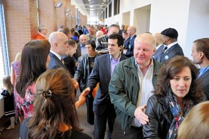 Candidates line the halls of the IBEW Hall on Sunday to greet incoming committee members, who made their endorsements for this year's elections.
