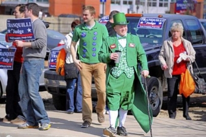 Kevin Larkin of Verona sports a leprechan suit as he strolls through the crowd endorsing P.J. Murray for Common Pleas judge during the Allegheny County Democratic Committee's endorsement meeting, held Sunday afternoon at the IBEW building on the South Side.