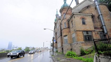 Route 28 traffic moves past historic St. Nicholas Church.