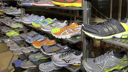 The footwear wall at True Runner on Walnut Street in Shadyside.
